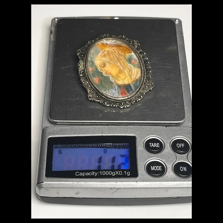 Vintage Filigree Silver 800 Framed Portrait BroochSilver 800Weighs 11.2 gramsMeasures 1.75 x 1.5 - 7