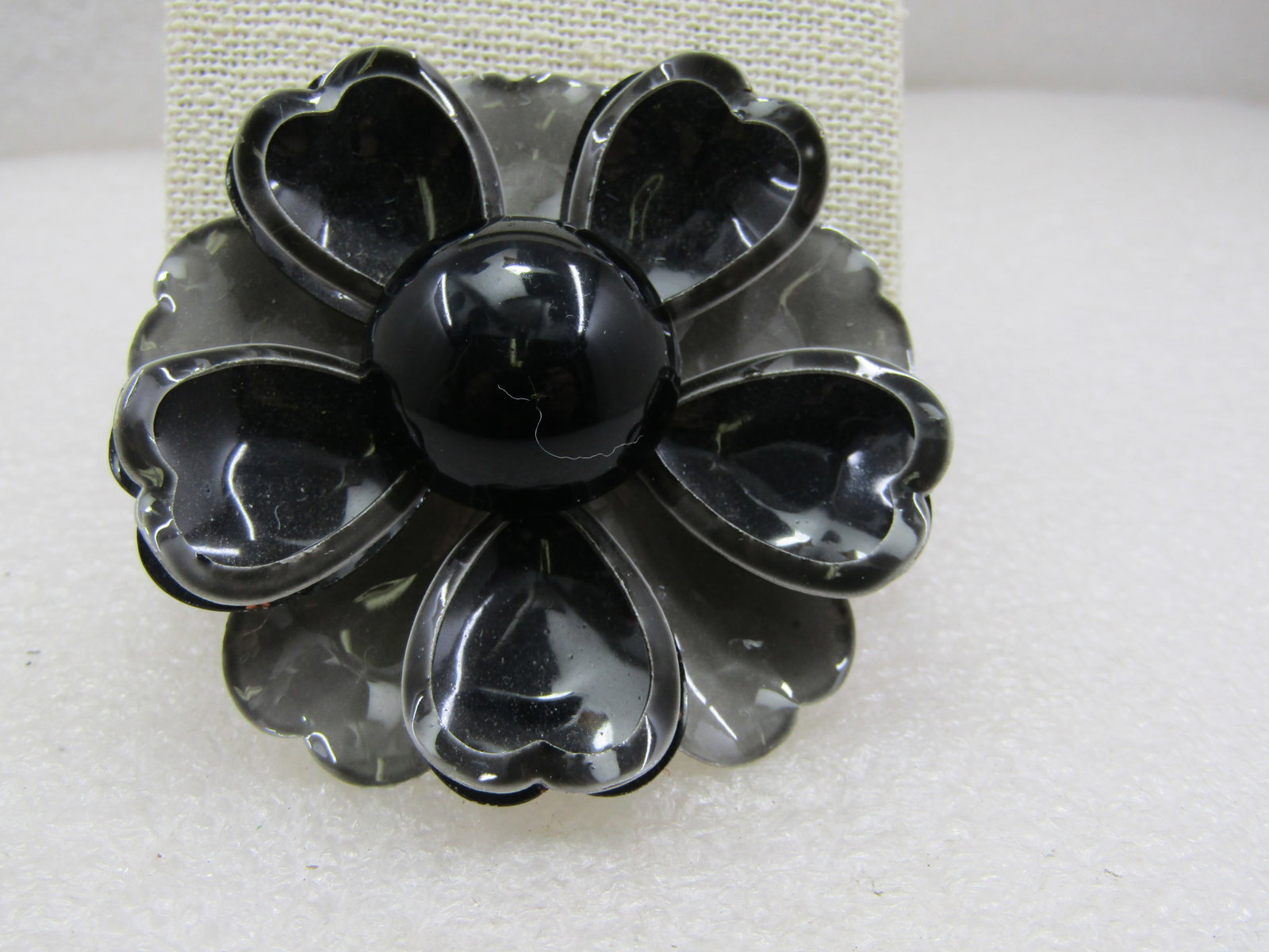 Vintage Black & Gray Enameled Floral Brooch, Tiered, 2.25", 1960's: Vintage Black & Gray Enameled Floral Brooch, Tiered, 2.25", 1960's. The bottom tiered is a dove gray enameled tier with scalloped edges with a subtle heart shape with slightly darker tips. The second 