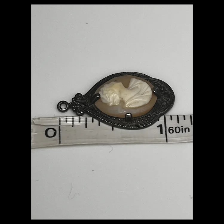 Vintage Sterling Carved Shell Cameo and Marcasite PendantWeight - 2.9 Grams1 x 1.5 Inches - 5