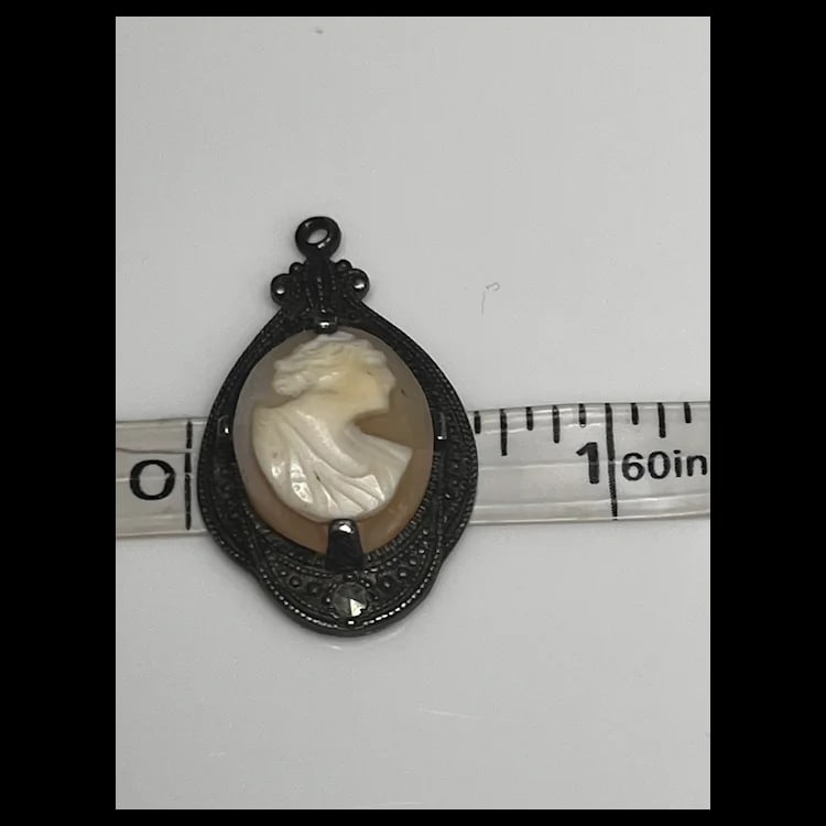 Vintage Sterling Carved Shell Cameo and Marcasite PendantWeight - 2.9 Grams1 x 1.5 Inches - 6