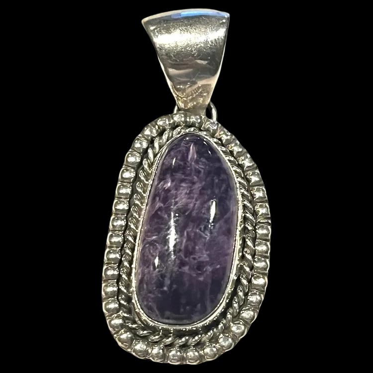 Vintage Southwestern Charoite Sterling SIlver Large Pendant: Vintage Southwestern Charoite Sterling SIlver Large PendantHallmarked: SterlingWeighs: 12.7 gramsMeasures: 2.25 inches x 1 inchGood Condition. Please refer to the pictures and reach out with any