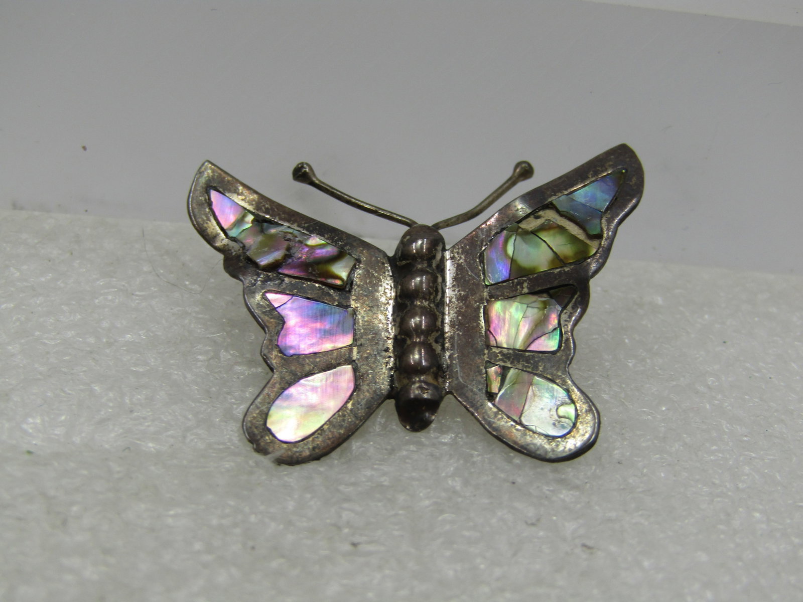 Vintage Sterling Inlaid Abalone Butterfly Brooch, Mid-Century, Signed: Vintage Sterling Inlaid Abalone Butterfly Brooch, Mid-Century, Signed Playa and another word that can't be read. Markedd .925 with a weight of 2.92 gr. The pin is appx. mid-century it does have some