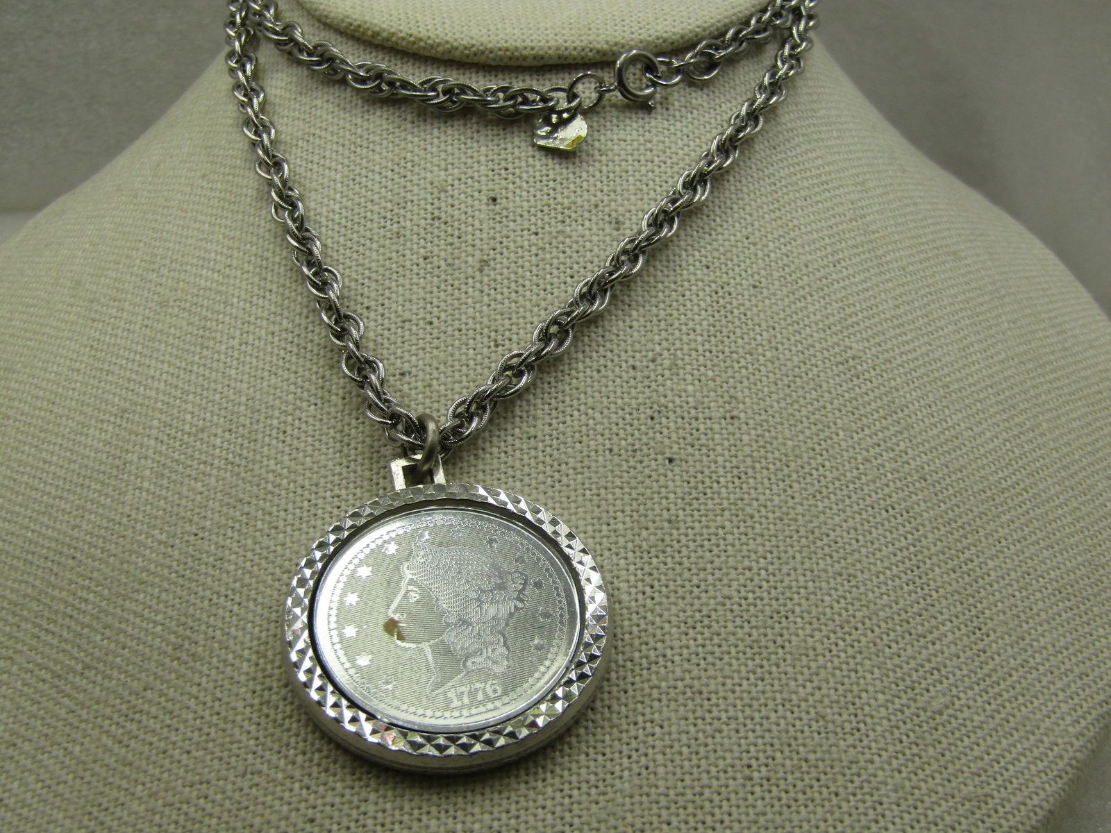 Vintage 24" Judy Lee Rope Chain & Coin Pendant Necklace, 1970's: Vintage 24" Judy Lee Rope Chain & Coin Pendant Necklace, 1970's. The coin is a replica $20 coin silver tone with ridge frame. The pendant is just short of 1.5" round. The chain is a 4mm multi-link smo