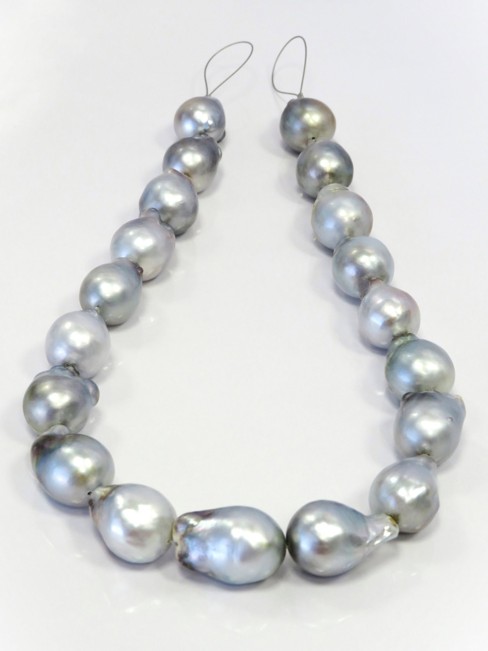 15-17mm Baroque Silver-Blue South Sea Pearl Necklace Strand: Title: 15-17mm Baroque Silver-Blue South Sea Pearl Necklace Strand Description:A-AA Grade High luster, Drop-Baroque Silver-Blue, with minimal spots/blemishes, 19 pearl pieces, 19 inches long