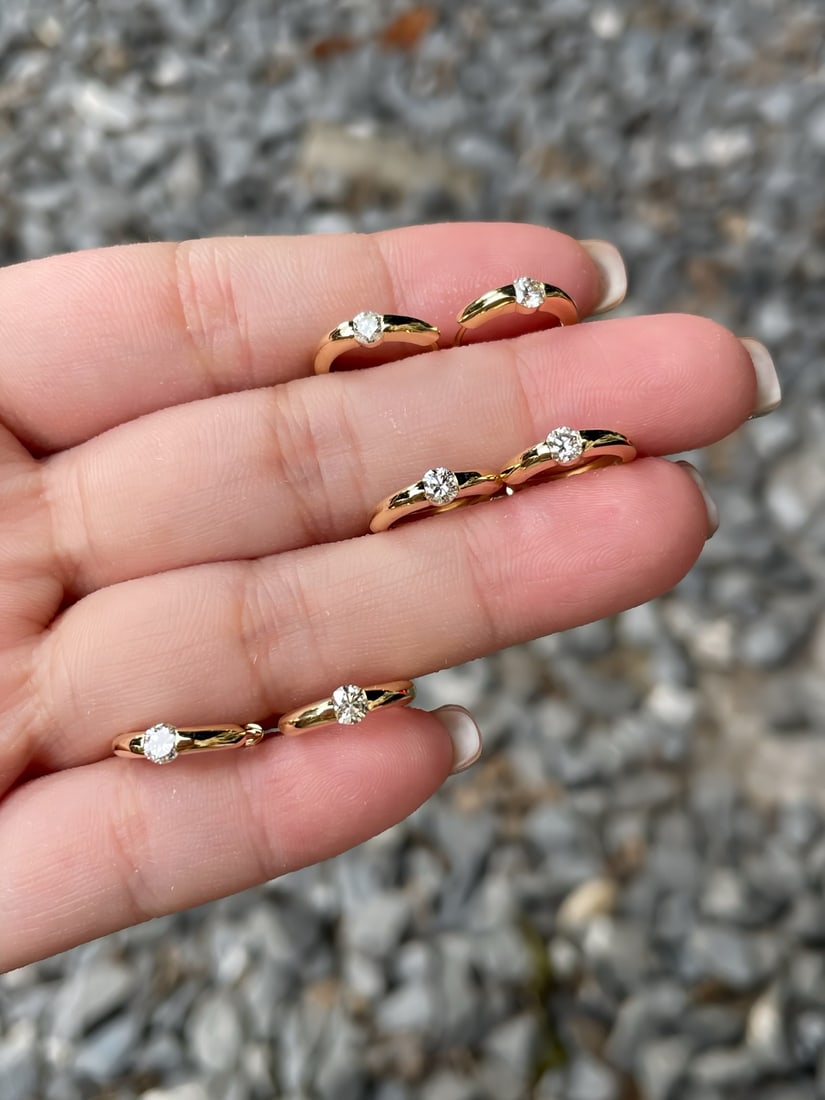 A pair of 18K gold diamond earrings. - 2