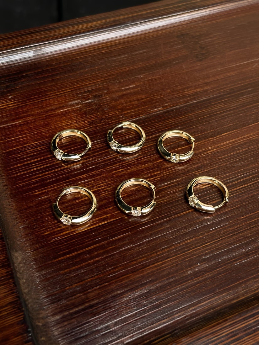 A pair of 18K gold diamond earrings. - 3