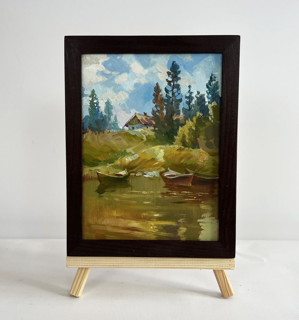 Oil painting Silence in nature near the lake Yuriy Suprunchuk: NoAAA4395The painting "Silence in Nature Near the Lake" captures a serene moment of tranquility, where nature and human presence exist in perfect harmony. The composition is centered around a calm lak