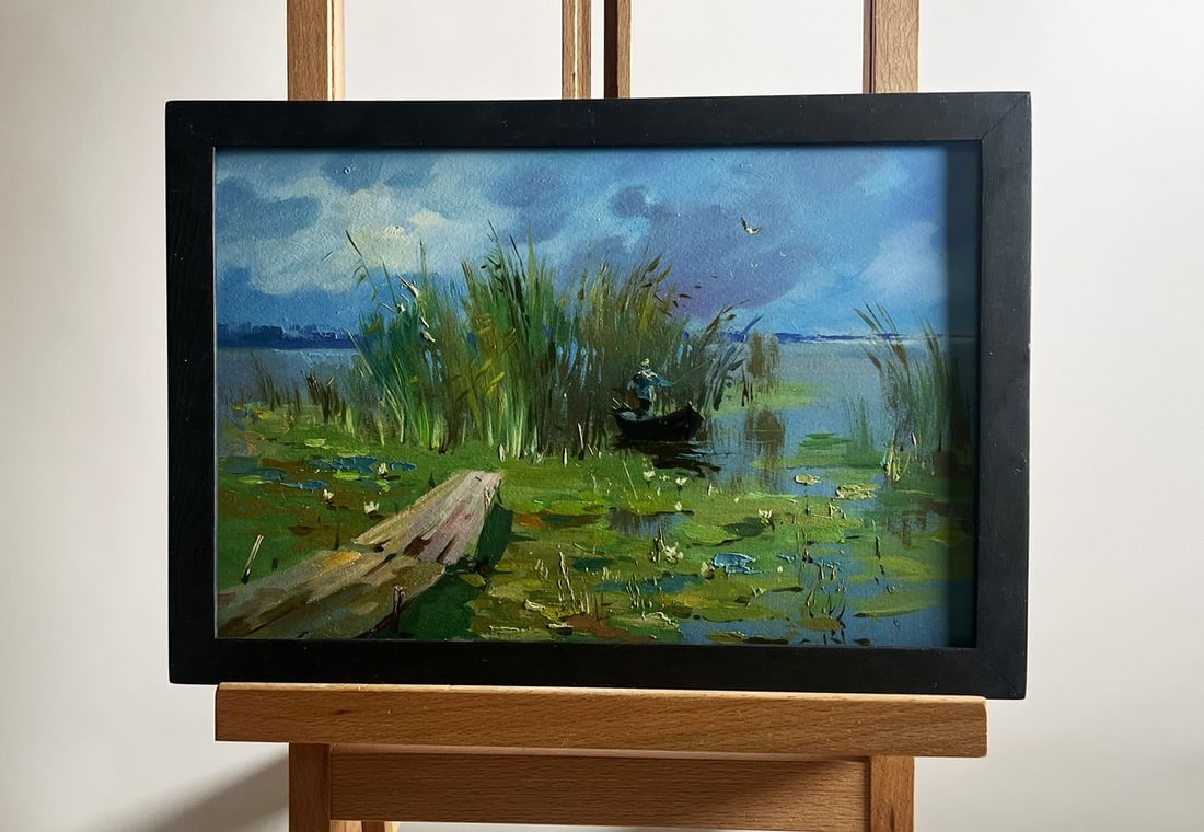 Oil painting On a boat near the reeds Yuriy Suprunchuk: NoAAA4190The painting titled "On a boat near the reeds" immerses the viewer in a tranquil waterscape, where nature's harmony is depicted with rich colors and expressive brushstrokes. The foreground is