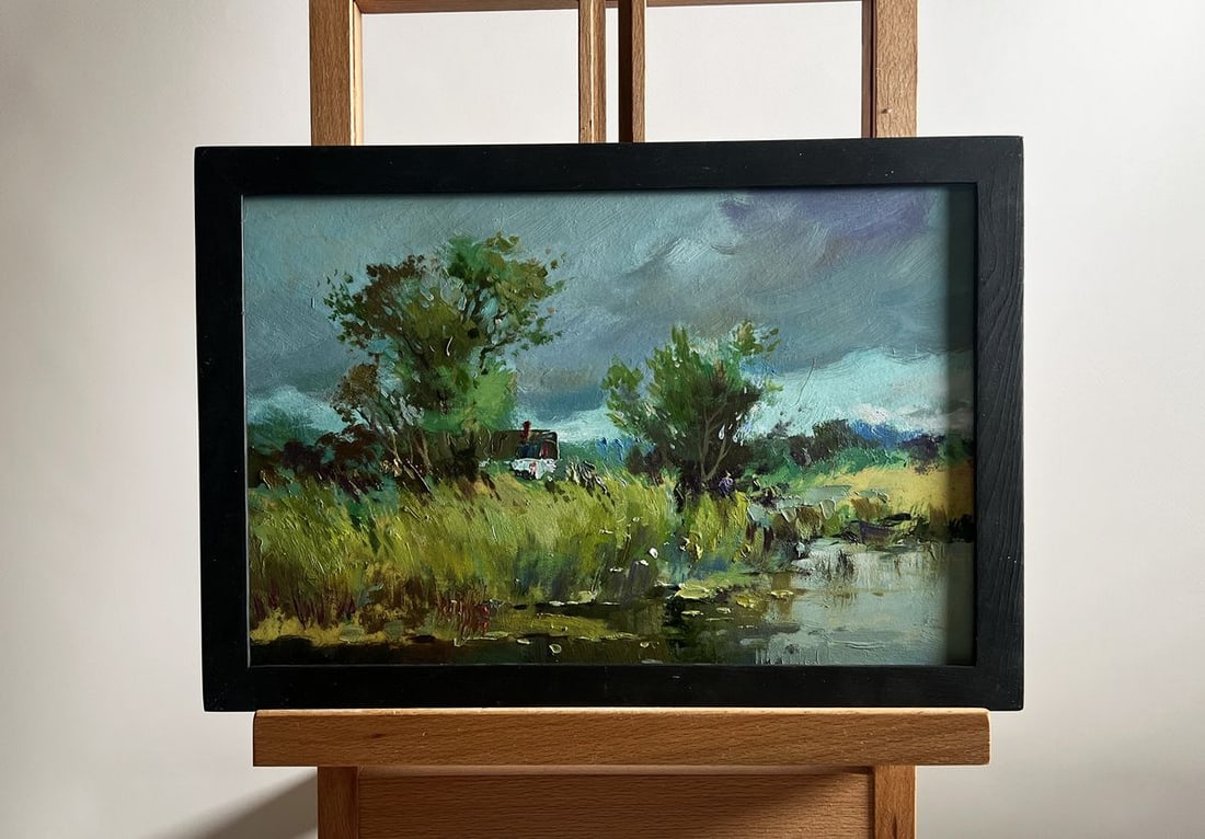 Oil painting On the outskirts of the village Yuriy Suprunchuk: NoAAA4199The painting titled "On the outskirts of the village" presents a picturesque rural scene that captures the essence of solitude, nature, and the simple life on the edge of a small settlement. 