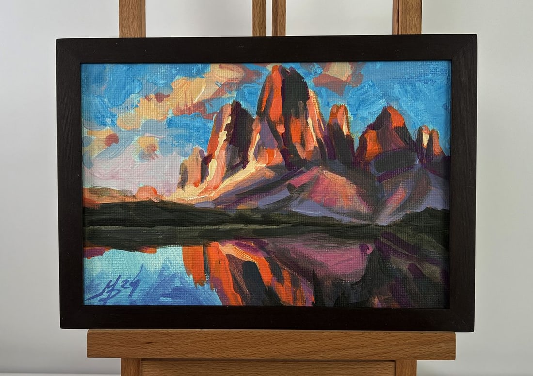 Acrylic painting Mountain valley and lake Mykhailo Patskan: NoAAA4885The acrylic painting on cardboard titled "Mountain Valley and Lake" captures a dramatic and awe-inspiring moment in nature, where the grandeur of towering peaks meets the tranquility of a ref