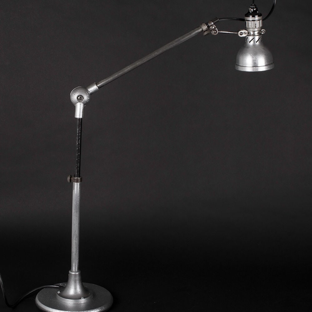 French industrial modernist task lamp Lumina mounted on a base: French modernist lamp made in the 1950's by LUMINA , a French company since defunct , the particularity of the connection is the ability to be manipulated in any shape or form desired in the style of 