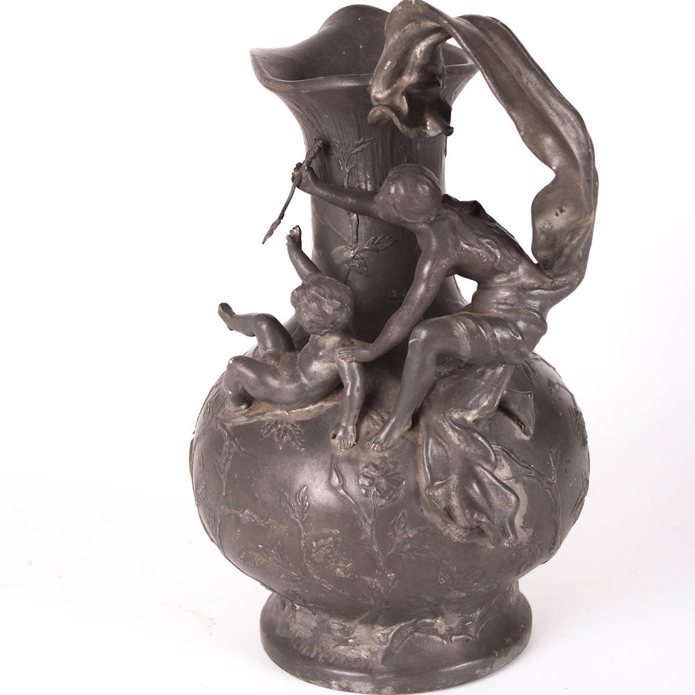 Elsie Thomas Ward HERING (1872-1923) pewter vase with decoration: Around 1898, Ward traveled to Paris where she created the Boy and Frog sculpture that was later awarded a medal at the 1904 St. Louis Worlds Fair. Before moving back to Denver in 1900, Ward also enter