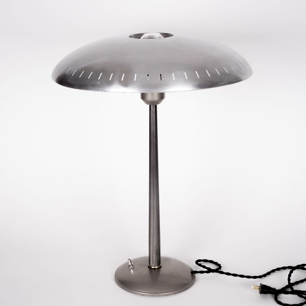 1950's Philips Desk Lamp designed by Louis Kalff Senior: While at Philips, Kalff helped define the overall color, material, and form choices for a variety of projects. He also designed advertisements, branding, exhibitions, lighting, and various other produ