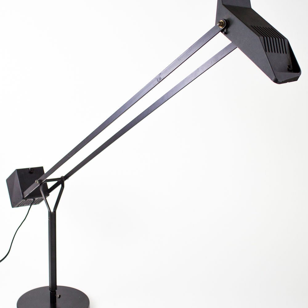 FASE - 1980's Spanish Halogen Desk Lamp: The Fase company was founded by the self-made Pedro Martin Garcia and designer Luis Perez de la Oliva in 1964. The Boomerang lamp was one of their first designs. Initially they sold their lamps to