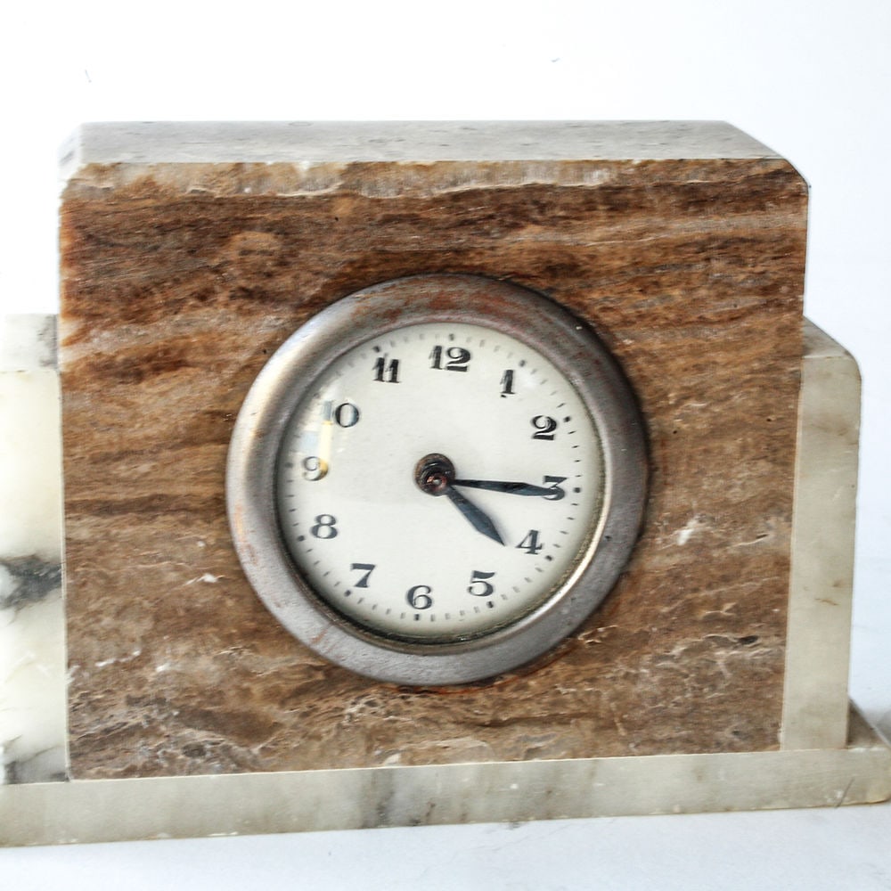 French art deco marble desk clock: French art deco desk clock with marble body , seems to work but will need revision , mechanic with rewiring key. H.4 x L.6 Clock face 2.1/2 Reserve: $120.00 Shipping: Domestic: Flat-rate of $30.00 to 