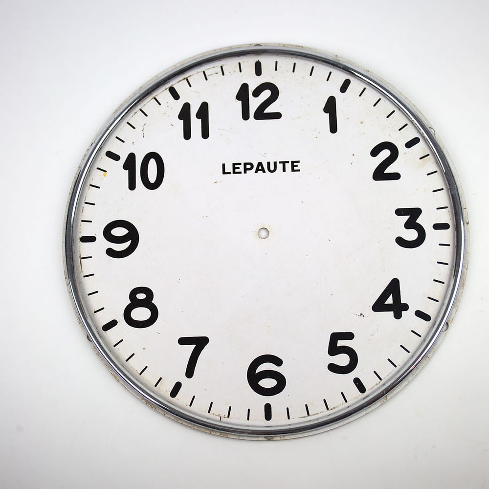 Early 20th factory clock face enameled: Early 20th century clock face from a factory or train station , include the nickel metal trim , make an interesting decoration .; size D.17.5 Reserve: $80.00 Shipping: Domestic: Flat-rate of $25.00 to