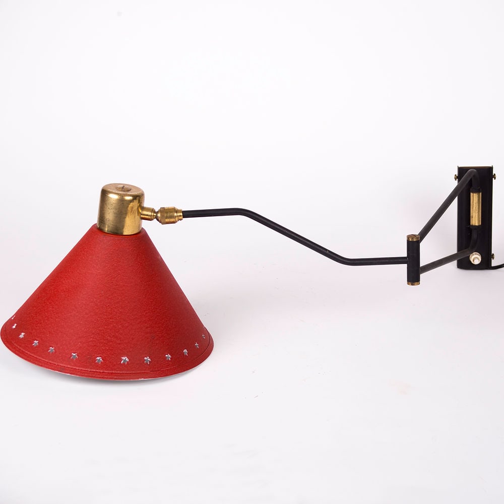 French mid century Rene Mathieu Adjustable Wall Lamp Editions Lunel: Cone " diabolo " swing arm wall light by Rene Mathieu for Lunel, France 1950, original dark red ( grenat ) colored enameled metal shade with decorative star perforations on an articulate brass arm and