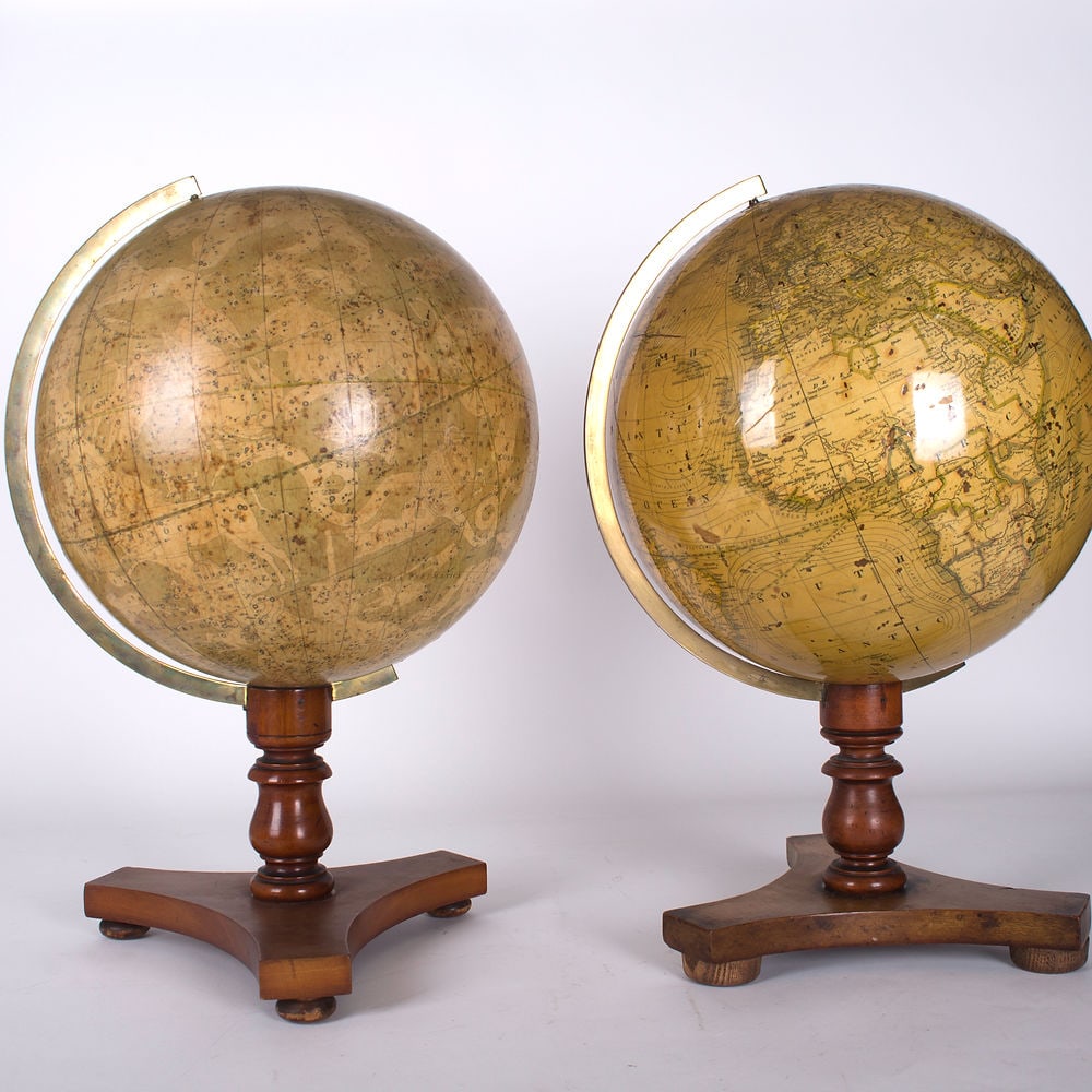 Smith & Son pair "12 of terrestrial and celestial globe 1860: The Smith family business, based in London, was started by Charles Smith in 1799. He was the "engraver to the Prince of Wales" and initially made maps. Later, he created small and portable globes, pro
