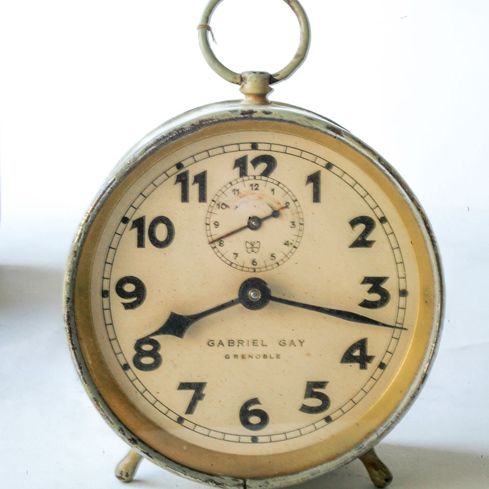 French green art deco alarm Gabriel Gay Grenoble: French Art Deco green alarm clock , makerGabriel Gay from grenoble, not working condition , good for decorative purpose or to refurbished with an electrical mecanism D.4 1/2 x W.2 3/4 Reserve: $60.00 