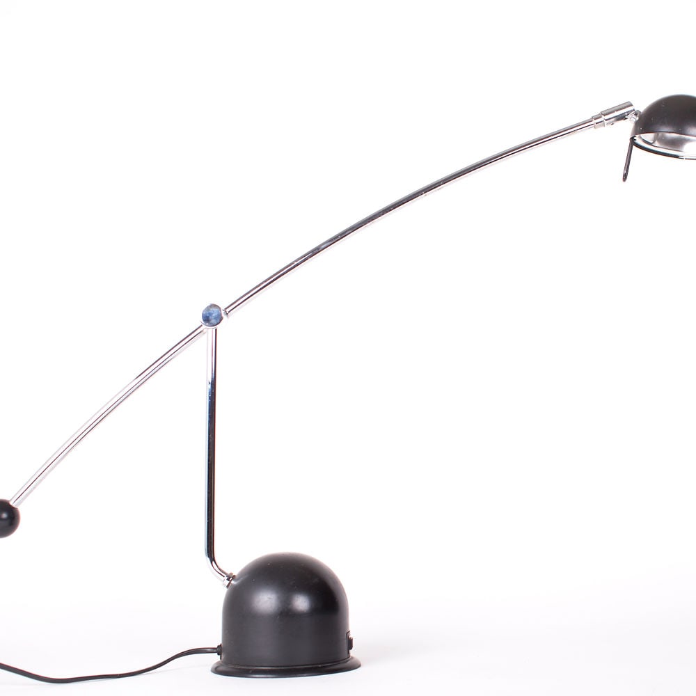 Light Paolo Piva for Stefano Cevoli 1983.: Meridiana desk lamp designed by Paolo Piva for Stefano Cevoli in 1983. This light can rotate up and down degrees and the cap is also adjustable. Unmarked; H.20 in x Basse .5 in x Reflector 3 in .L.22 