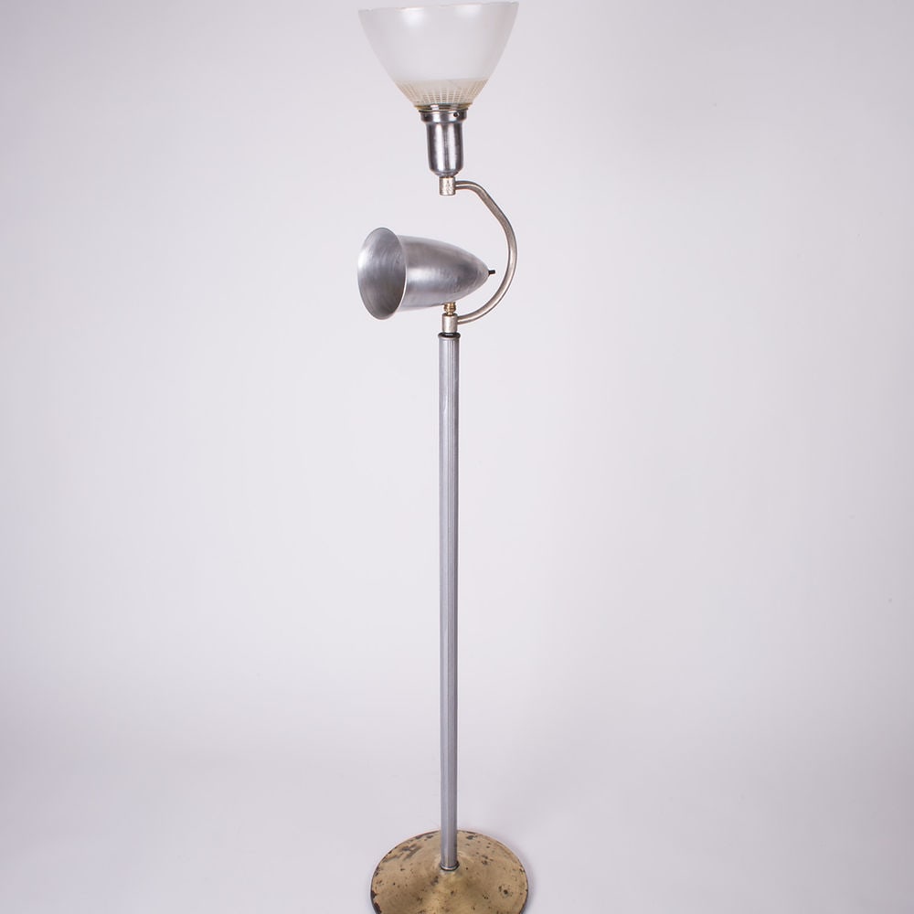 Early mid century Stilnovo Arteluce in the manner of: Interesting early mid century in the style of Stilnovo , odd and inusual shape .; Rewired with US Socket , some oxidation on the stripped metal .; H.58.5 in x Base 12 in with swiveling spot . Reserve:
