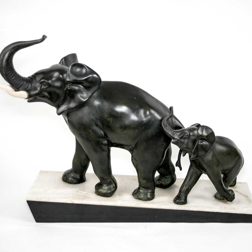 LARGE FRENCH ART DECO ELEPHANTS SCULPTURE IRENEE ROCHARD: Made in France in the 1930's this sculpture reflect the democratic desire of that time to produced affordable art . It is metal instead of bronze but the quality of design is here .It was done with th