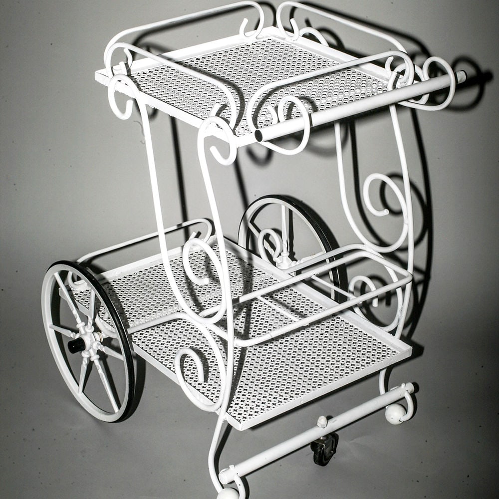 FRENCH-MODERNIST-TROLLEY-MATEGOT Mid-century serving table rigitulle 2: French modernist bottle holder made in the 1950's by Mathieu Mategot , it is made with his trademark bent metal rigitulle adding whimsical effect .He designed furniture and object for a short time , i