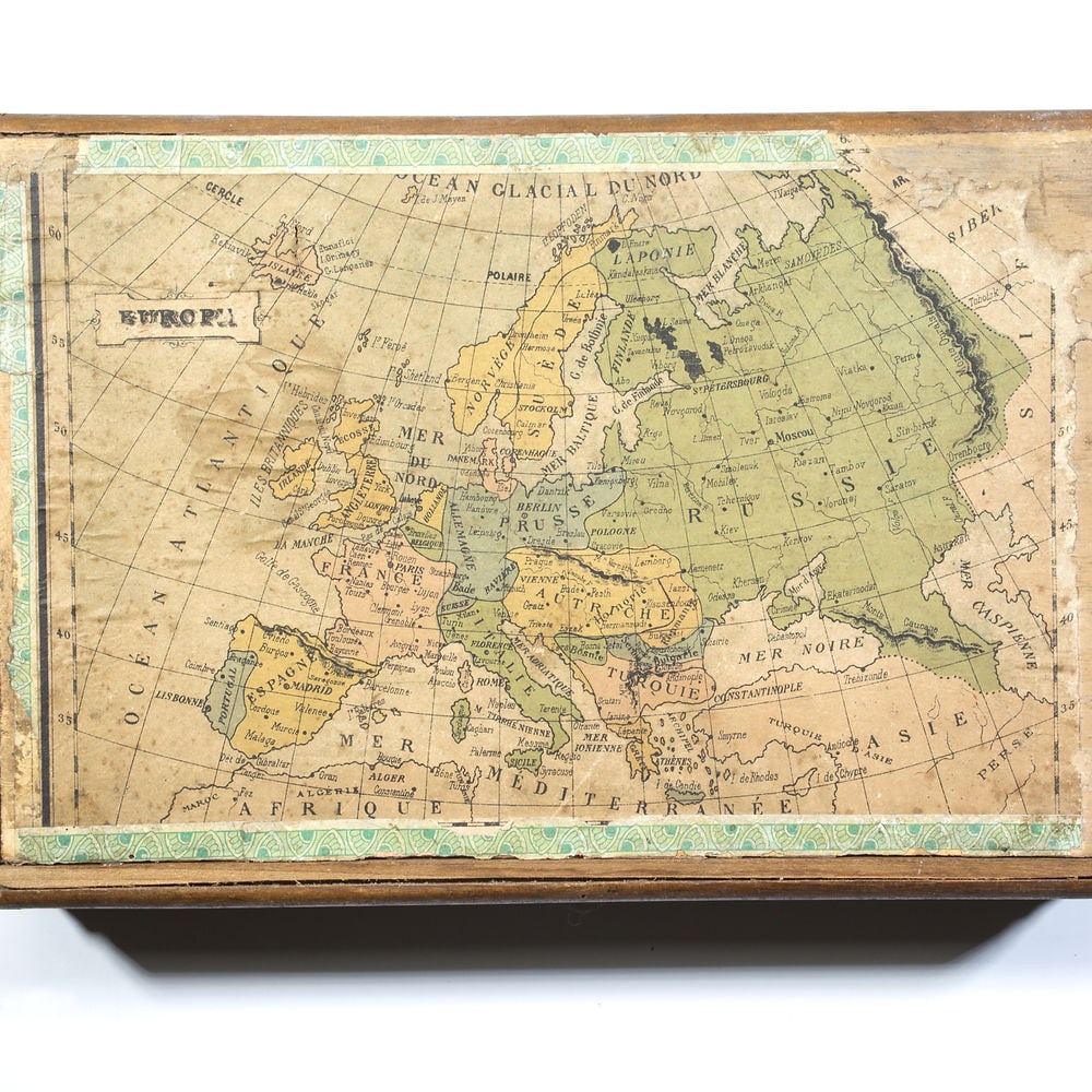 Puzzle box with wood cubs with maps of the worlds atlas 1890 french: Cartographical Cube toy 1889 Maison jullien (J L) Antique Map Charles Verneau Appealing cartographical toy, consisting of 20 wooden cubes, each side of each cube with a map section pasted on, thus for