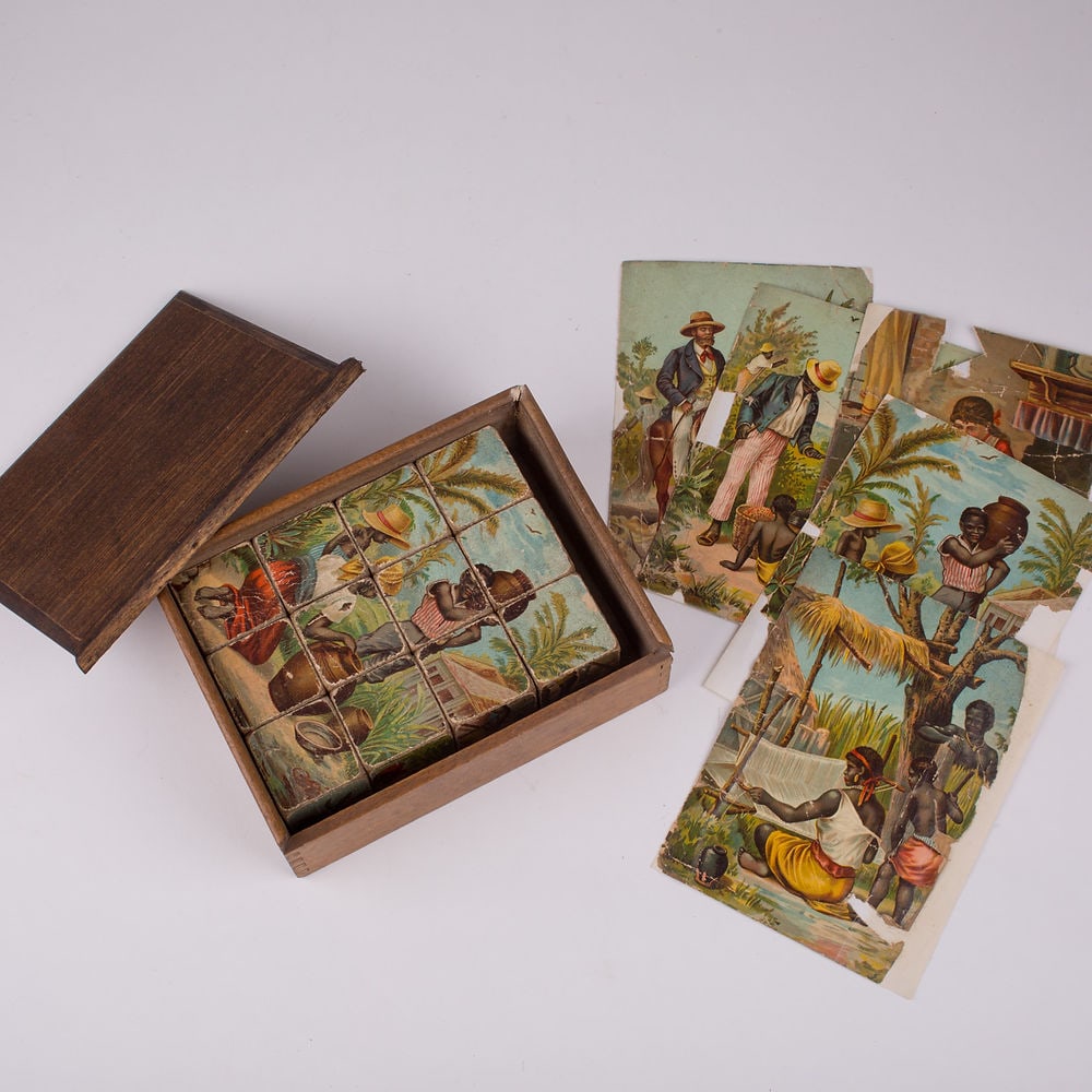 French wood cube puzzle chromolithography racially charge subject 19th.: French wood puzzle from the late 19th . illustrating the racial and colonial view of the late 19th . While difficult to accept it is necessary to look at the past and keep artifact so we can reflect o