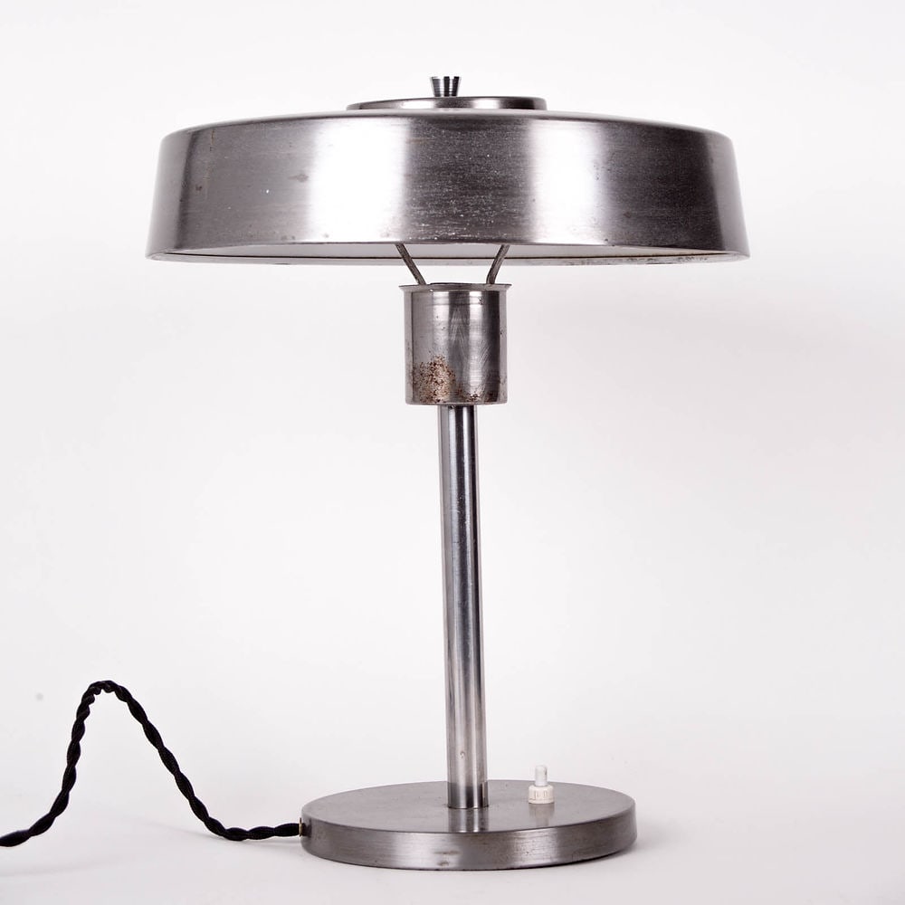 1960s Philips Desk Lamp designed by Louis Kalff large rod: While at Philips, Kalff helped define the overall color, material, and form choices for a variety of projects. He also designed advertisements, branding, exhibitions, lighting, and various other produ