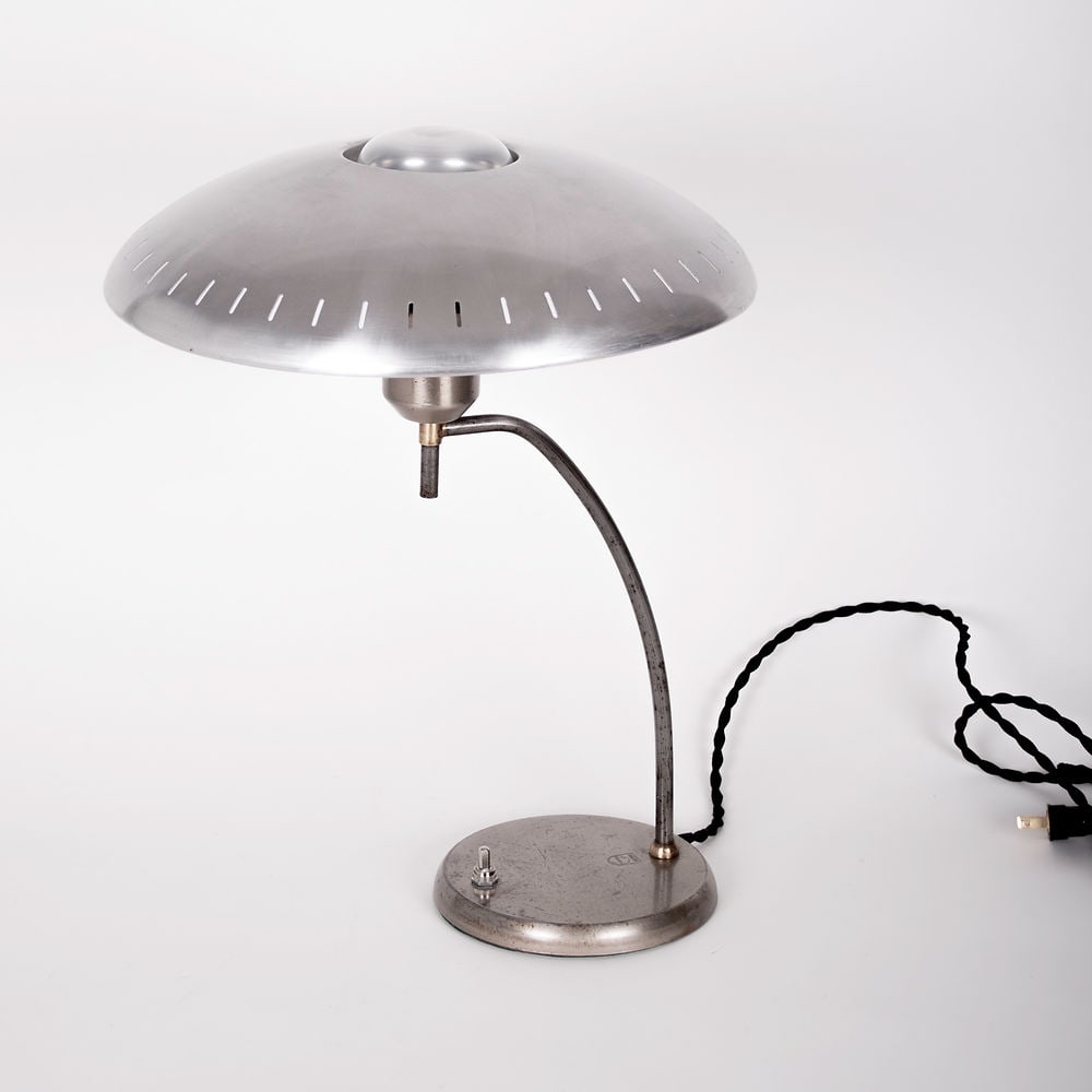 1950's Philips Desk Lamp designed by Louis Kalff Junior: While at Philips, Kalff helped define the overall color, material, and form choices for a variety of projects. He also designed advertisements, branding, exhibitions, lighting, and various other