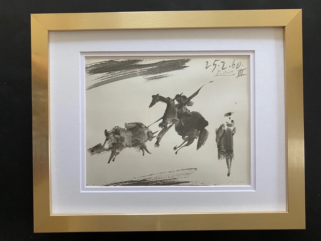 PABLO PICASSO 1961 SIGNED TOREROS PRINT FRAMED ART: This is a Beautiful and Scarce 1961 Print after PABLO PICASSO " CORRIDA DE TOROS " SIGNED ON THE PLATE from His Collection Dessins de Tauromachie Matted and Framed covering an area of 15x12 in.