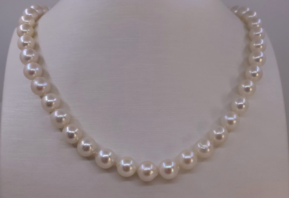 Necklace 9x9.5mm Akoya Pearls: Title: Necklace 9x9.5mm Akoya Pearls Description: A beautiful pearl necklace of white saltwater AAA Akoya pearls with exceptional lustre, finished with a solid silver clasp. The classic Akoya pearl is