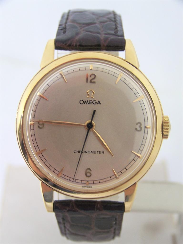 Vintage Solid 18k Gold OMEGA 17J Winding Watch 1950s Cal.30T2 SC RG CHRONOMETER: Vintage Solid 18k Gold OMEGA 17J Winding Watch 1950s Cal. 30T2 SC RG CHRONOMETER? EXLNT SERVICED? This Mens Omega watch is Swiss made Great present for yourself or someone you love as well as for vint