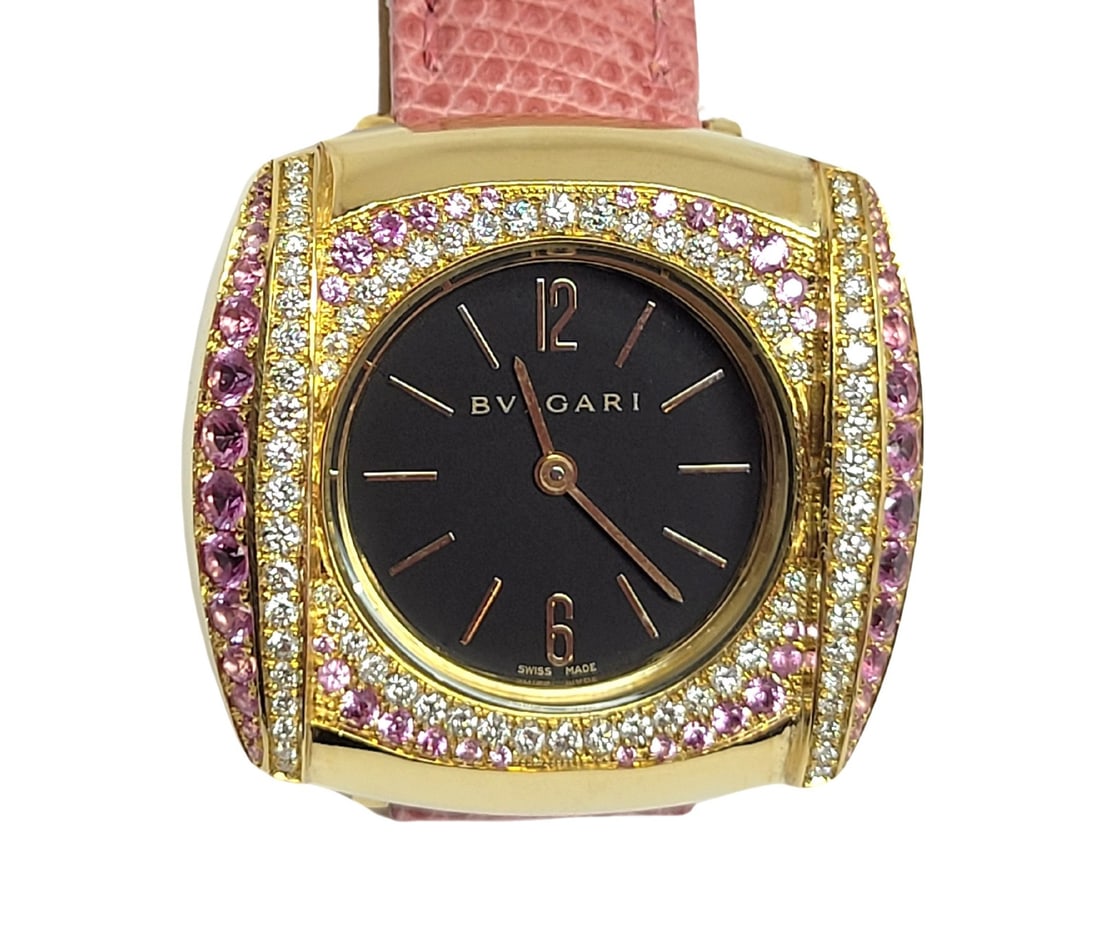 Solid 18k Customized BULGARI Ladies Quartz Watch BB26GL / Diamonds & Sapphires: Solid 18k Customized BULGARI Ladies Quartz Watch AT26 GL w/ Diamonds & Pink Sapphires This Ladies Bulgari watch is Swiss made.. Great present for yourself or someone you love! * Solid & heavy 18k yell
