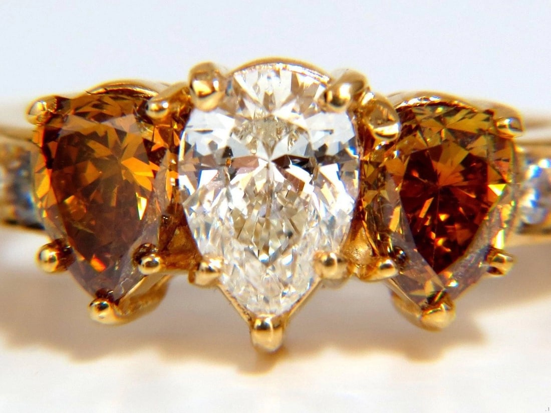 Natural .78ct Pear & 1.52ct Fancy Yellow Brown Diamonds Ring 18kt 10027 *v: Title: Natural .78ct Pear & 1.52ct Fancy Yellow Brown Diamonds Ring 18kt 10027 *v Description: Natural .78ct Pear & 1.52ct Fancy Yellow Brown Diamonds Ring 18kt 10027 $8,000.00 PRODUCT DESCRIPTION