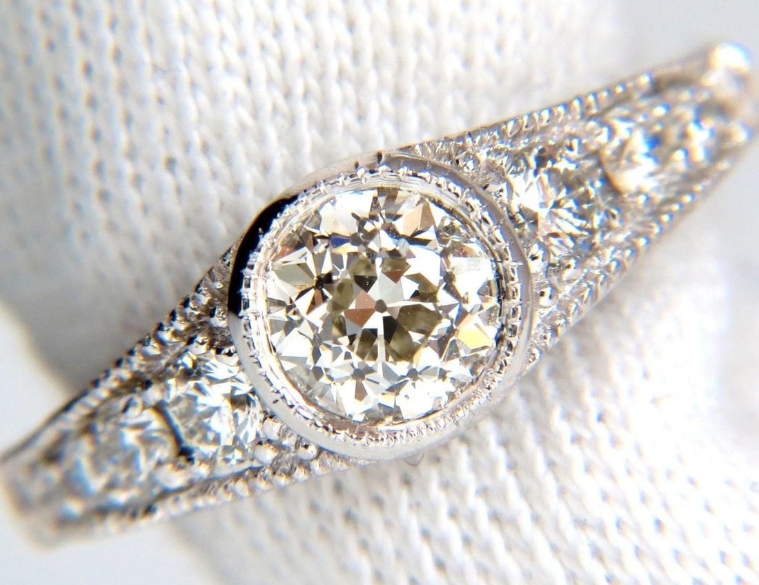 .95ct Gypsy Set Natural Diamonds Ring 14kt. 10025**: Title: .95ct Gypsy Set Natural Diamonds Ring 14kt. 10025** Description: .95ct Gypsy Set Natural Diamonds Ring 14kt. 10025 $8,000.00 PRODUCT DESCRIPTION .95ct Natural round brilliant center diamond