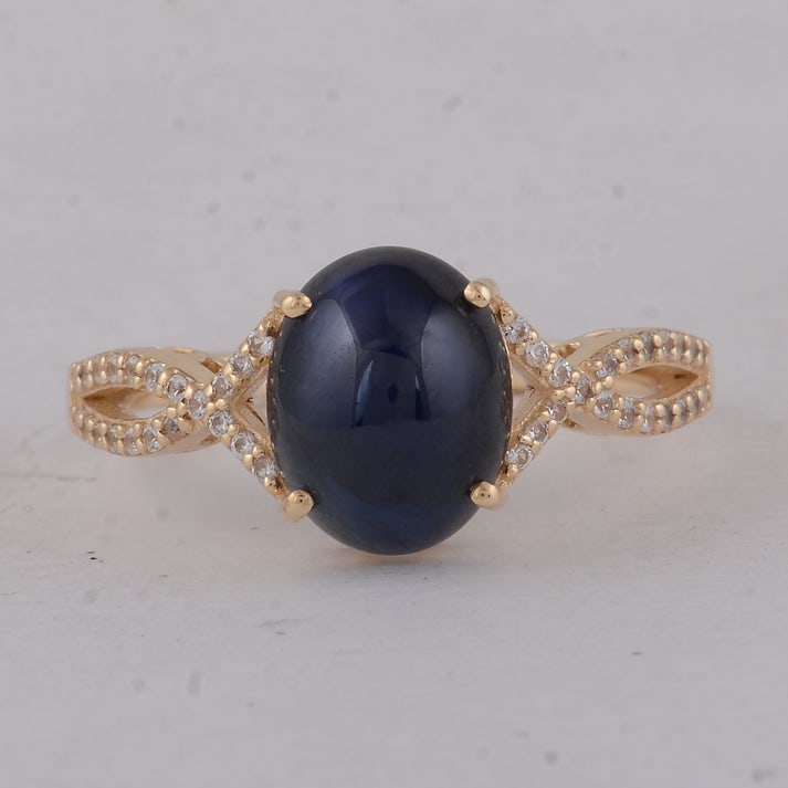 4.14 Ct Oval Sapphire 9K Gold Ring: 4.14 Total Carat Sapphire 9K Gold Ring Specifications: Total Weight 2.83 g Center Gemstone Sapphire Gemstone Carat Weight 3.97 Carats Gemstone Measurements 9.80X7.80X5.30 mm Additional Gemstones White