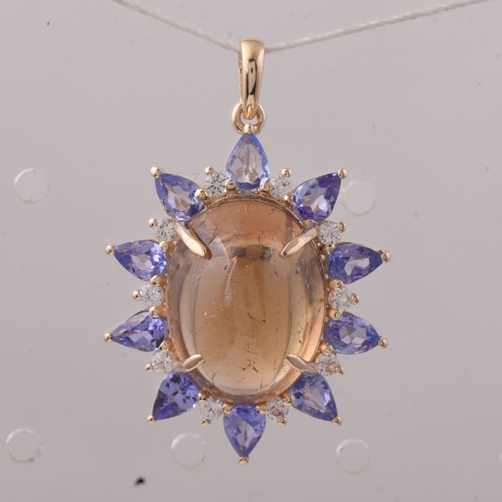 11.37 Ct Oval Tourmaline 9K Gold Pendant: 11.37 Total Carat Tourmaline 9K Gold Pendant Specifications: Total Weight 3.926 g Center Gemstone Tourmaline Gemstone Carat Weight 9.9 Carats Gemstone Measurements 14.60X11.20X8.40 mm Additional Gemst
