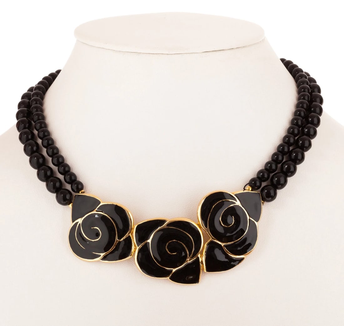 Balenciaga Black Enamel Flower Necklace: Title:Balenciaga Black Enamel Flower Necklace Description:Amazing 18 kt gold plated over costume metal necklace with two strands of black glass beads, and black enamel floral centerpiece. Circa, 1970�