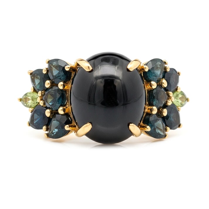 8.82 Ct Oval Sapphire 9K Gold Ring: 8.82 Total Carat Sapphire 9K Gold Ring Specifications: Total Weight 3.855 g Center Gemstone Sapphire Gemstone Carat Weight 6.27 Carats Gemstone Measurements 11.10X9.10X5.90 mm Additional Gemstones Mul