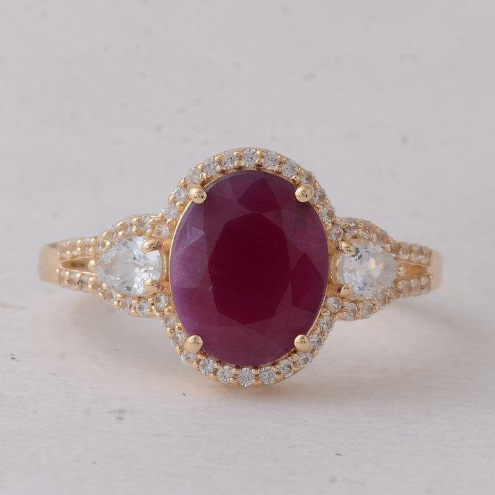 4.01 Ct Oval Ruby 9K Gold Ring: 4.01 Total Carat Ruby 9K Gold Ring Specifications: Total Weight 3.041 g Center Gemstone Ruby Gemstone Carat Weight 3.35 Carats Gemstone Measurements 10X8 mm Additional Gemstones White Sapphire