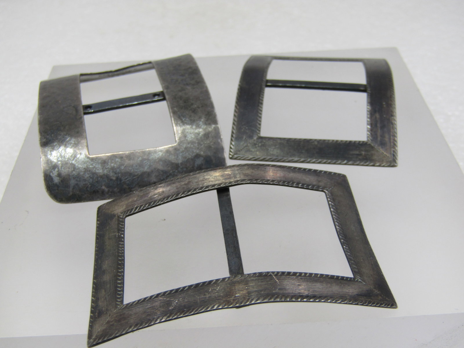 Vintage 3 Sterling Buckle Lot, Signed B.B.&B. and TPS, 1910-1930's: Title:Vintage 3 Sterling Buckle Lot, Signed B.B.&B. and TPS, 1910-1930's Description:Vintage 3 Sterling Buckle Lot, Signed B.B.&B. and TPS, 1910-1930's. There is a pair of sterling rectangular sash