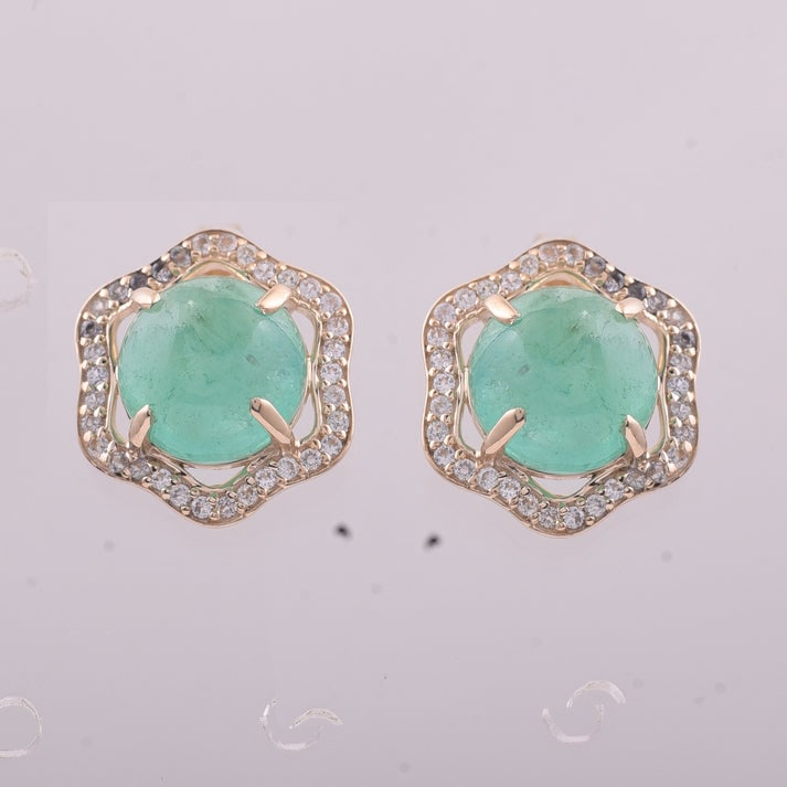 5.12 Ct Round Emerald 9K Gold Earrings: 5.12 Total Carat Emerald 9K Gold Earrings Specifications: Total Weight 2.722 g Center Gemstone Emerald Gemstone Carat Weight 4.82 Carats Gemstone Measurements 8 mm Additional Gemstones White Sapphire 