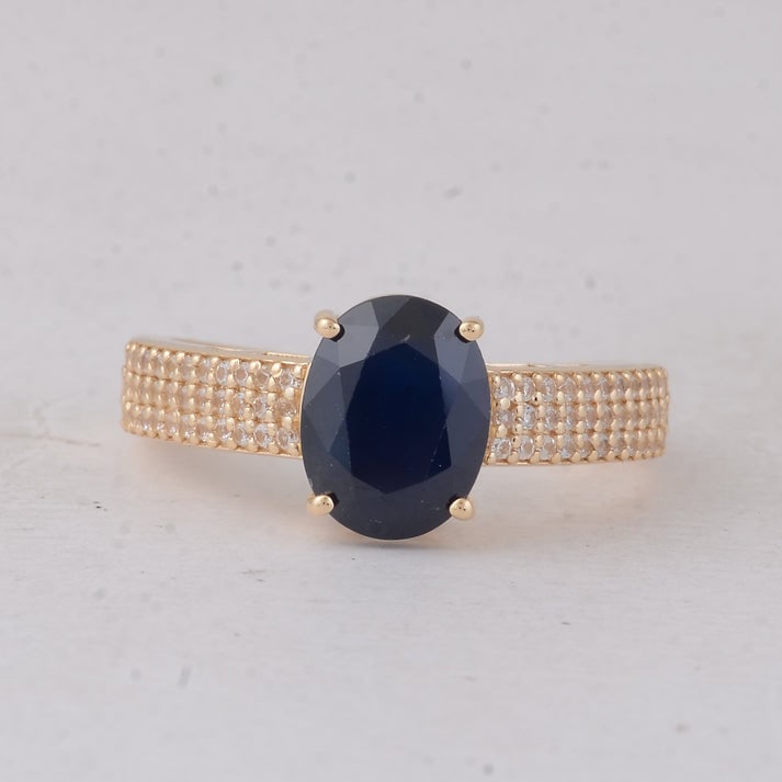 2.86 Ct Oval Sapphire 9K Gold Ring: 2.86 Total Carat Sapphire 9K Gold Ring Specifications: Total Weight 2.746 Center Gemstone Sapphire Gemstone Carat Weight 2.57 Carats Gemstone Measurements 9X7X4.60 mm Additional Gemstones White Sapphi
