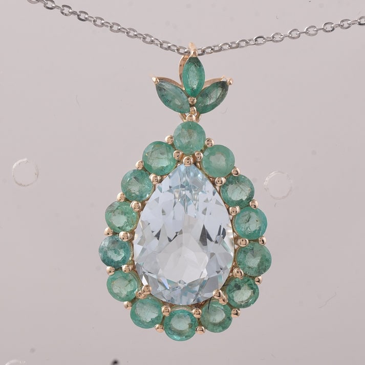 5.10 Ct Pear Aquamarine 9K Gold Pendant: 5.10 Total Carat Aquamarine 9K Gold Pendant Specifications: Total Weight 2.426 g Center Gemstone Aquamarine Gemstone Carat Weight 3.35 CaratsGemstone Measurements 13X9X5.60 mm Additional Gemstones