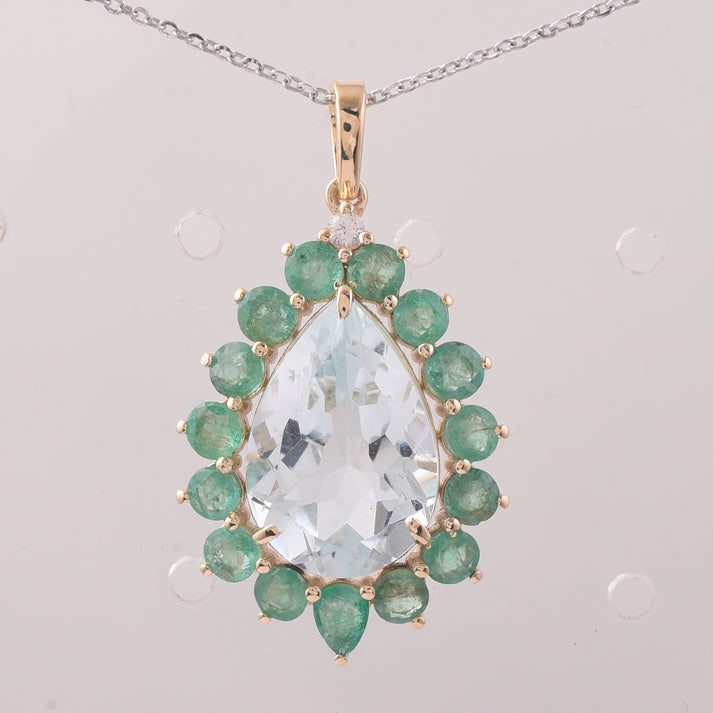 6.79 Ct Pear Aquamarine 9K Gold Pendant: 6.79 Total Carat Aquamarine 9K Gold Pendant Specifications: Total Weight 2.85 g Center Gemstone Aquamarine Gemstone Carat Weight 5.11 Carats Gemstone Measurements 15X10X6.50 mm Additional Gemstones
