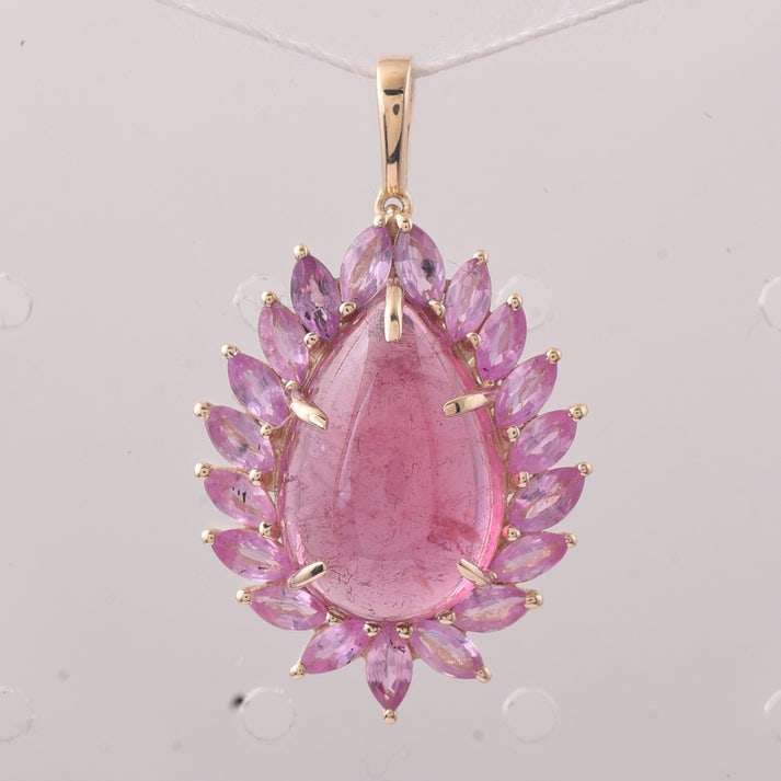 8.32 Ct Pear Tourmaline 9K Gold Pendant: 8.32 Total Carat Tourmaline 9K Gold Pendant Specifications: Total Weight 3.298 g Center Gemstone Tourmaline Gemstone Carat Weight 6.7 Carats Gemstone Measurements 14.90X10X5.60 mm Additional