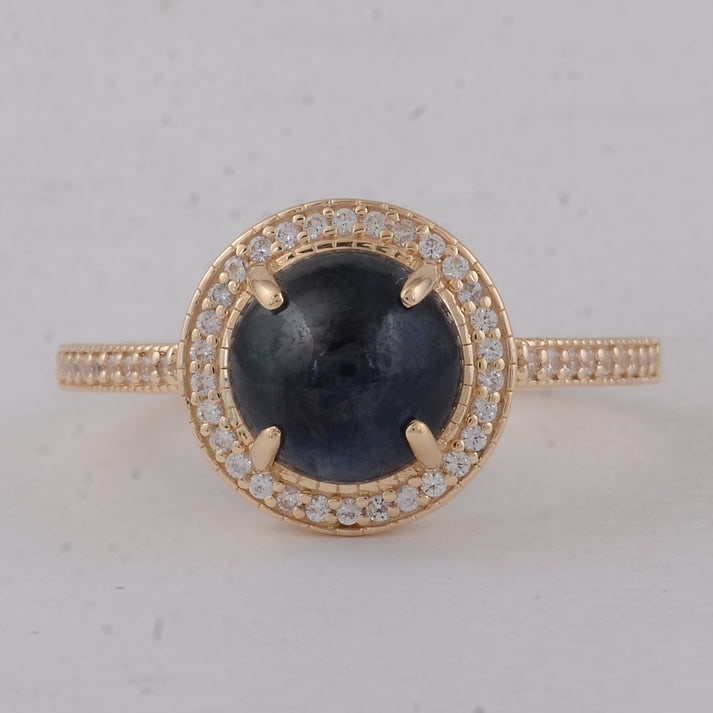 3.23 Ct Round Sapphire 9K Gold Ring: 3.23 Total Carat Sapphire 9K Gold Ring Specifications: Total Weight 2.73 g Center Gemstone Sapphire Gemstone Carat Weight 3.03 Carats Gemstone Measurements 8X8X4.80 mm Additional Gemstones White