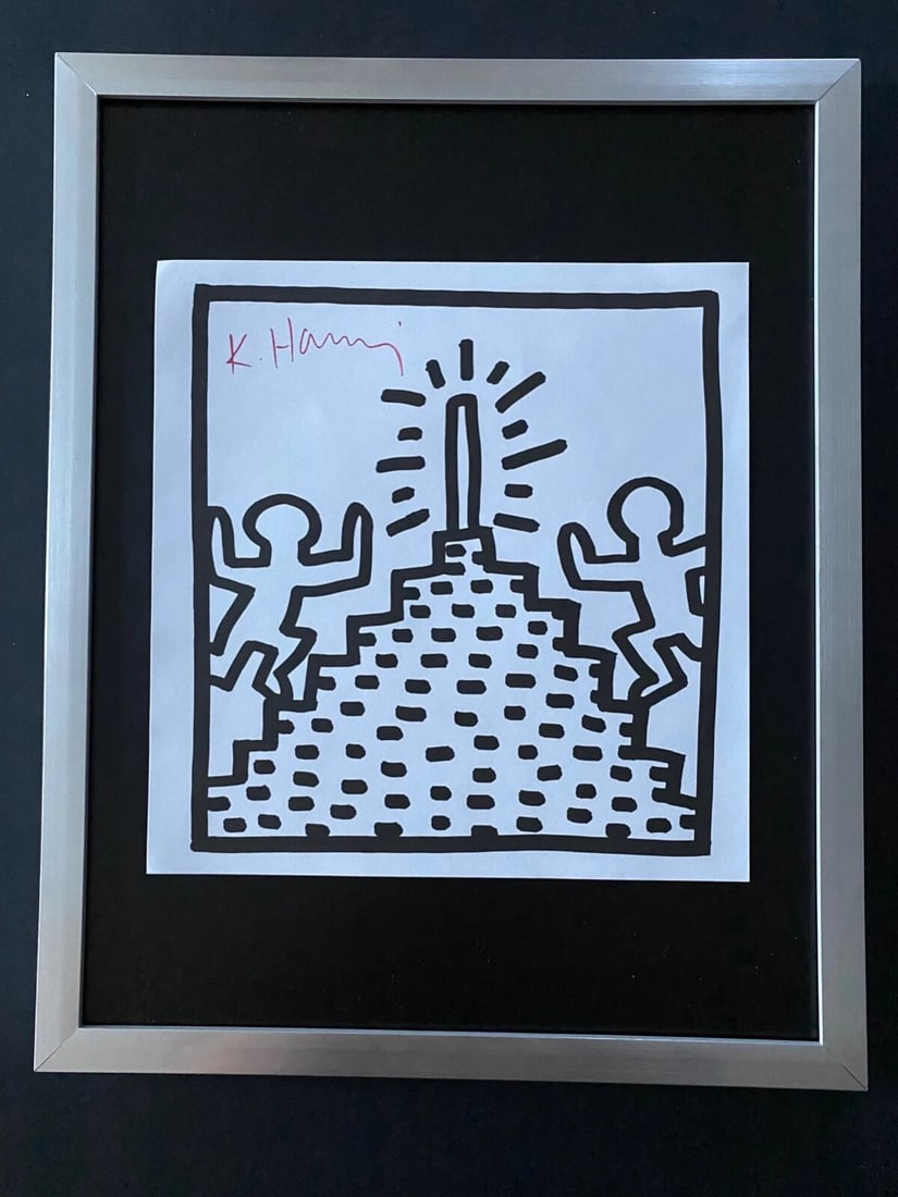 KEITH HARING + SIGNED VINTAGE PRINT FRAMED: This is a Beautiful and Scarce Vintage 1989 Print after Keith Haring FACSIMILE SIGNED IN RED INK Print is about 8x8in. Mounted and Framed covering an area of 15x12 in. Printed in Bond Paper after the